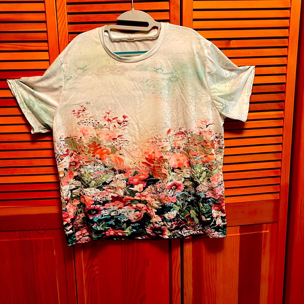 Floral Teeshirt. Brand new. Never worn. 4X but runs small.
